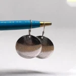 Handcrafted Berber spiral sterling silver earrings from North Africa